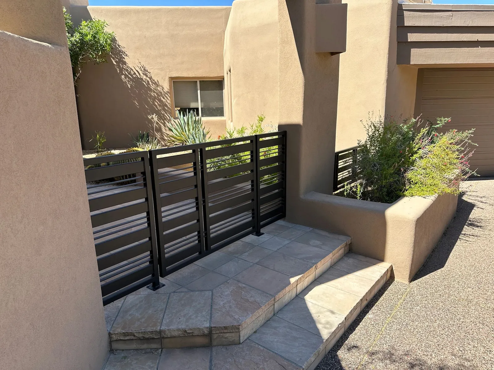 Metal courtyard gate from Arizona Screen Techs’ project library.