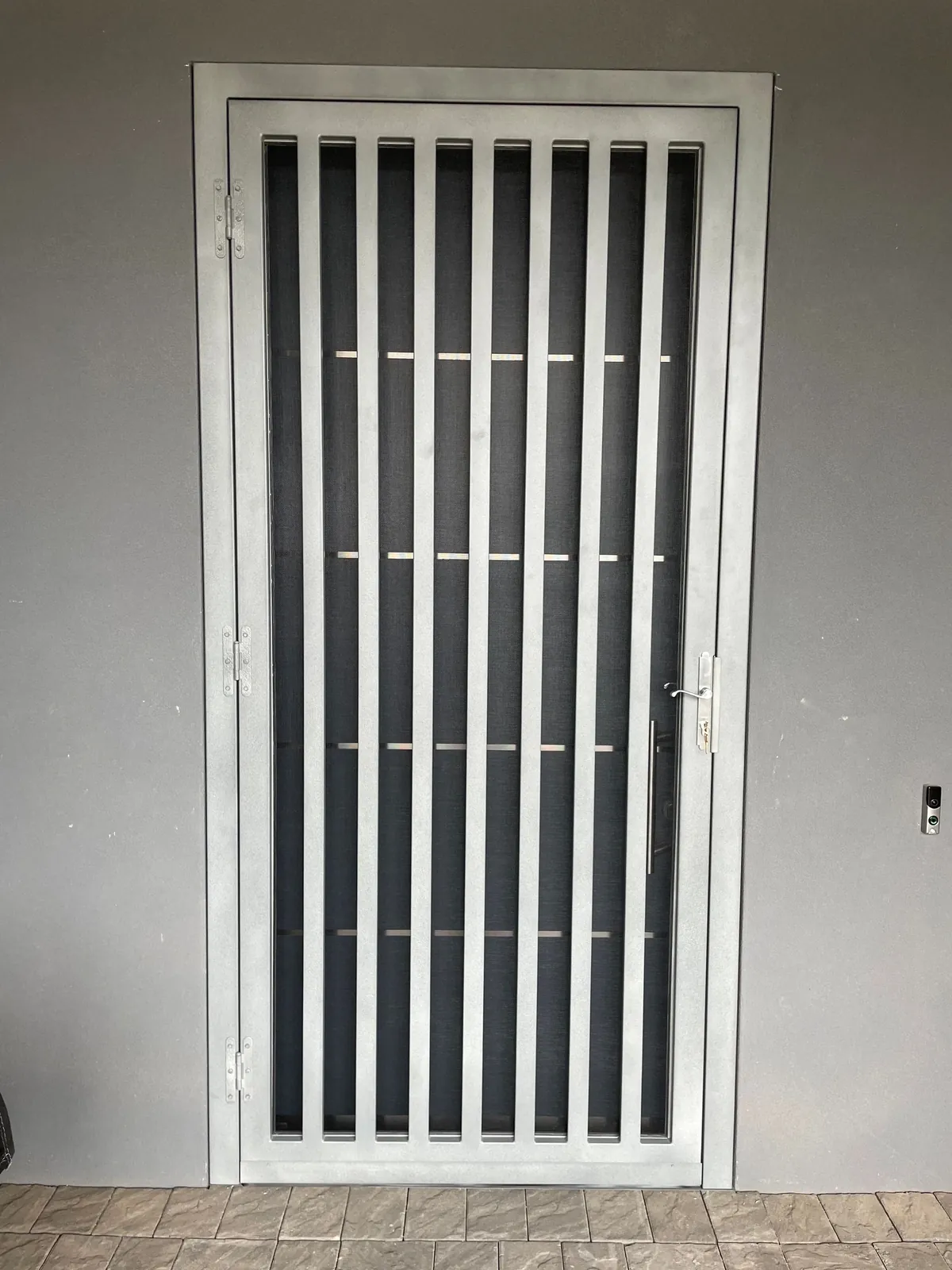 Door grille and hardware detail from Arizona Screen Techs’ project library.